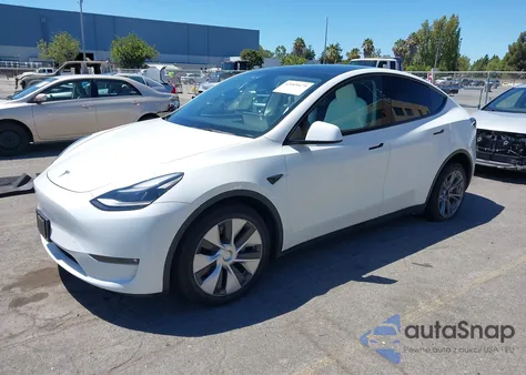 2023 Tesla Model Y Awd/Long Range Dual Motor All-Wheel Drive из США, поврежденный, VIN 7SAYGDEE3PF622553